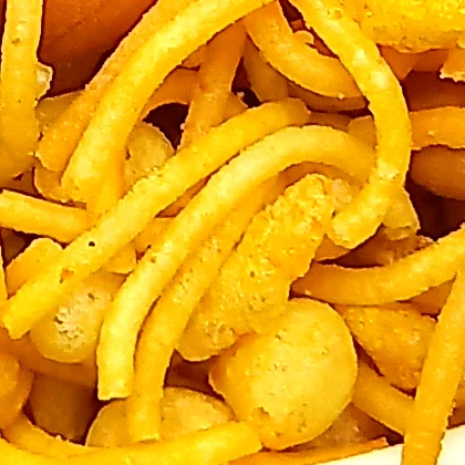 Close-up of golden kara sev strands