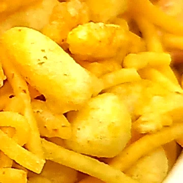 Close-up showing the red chilli and salt seasoning